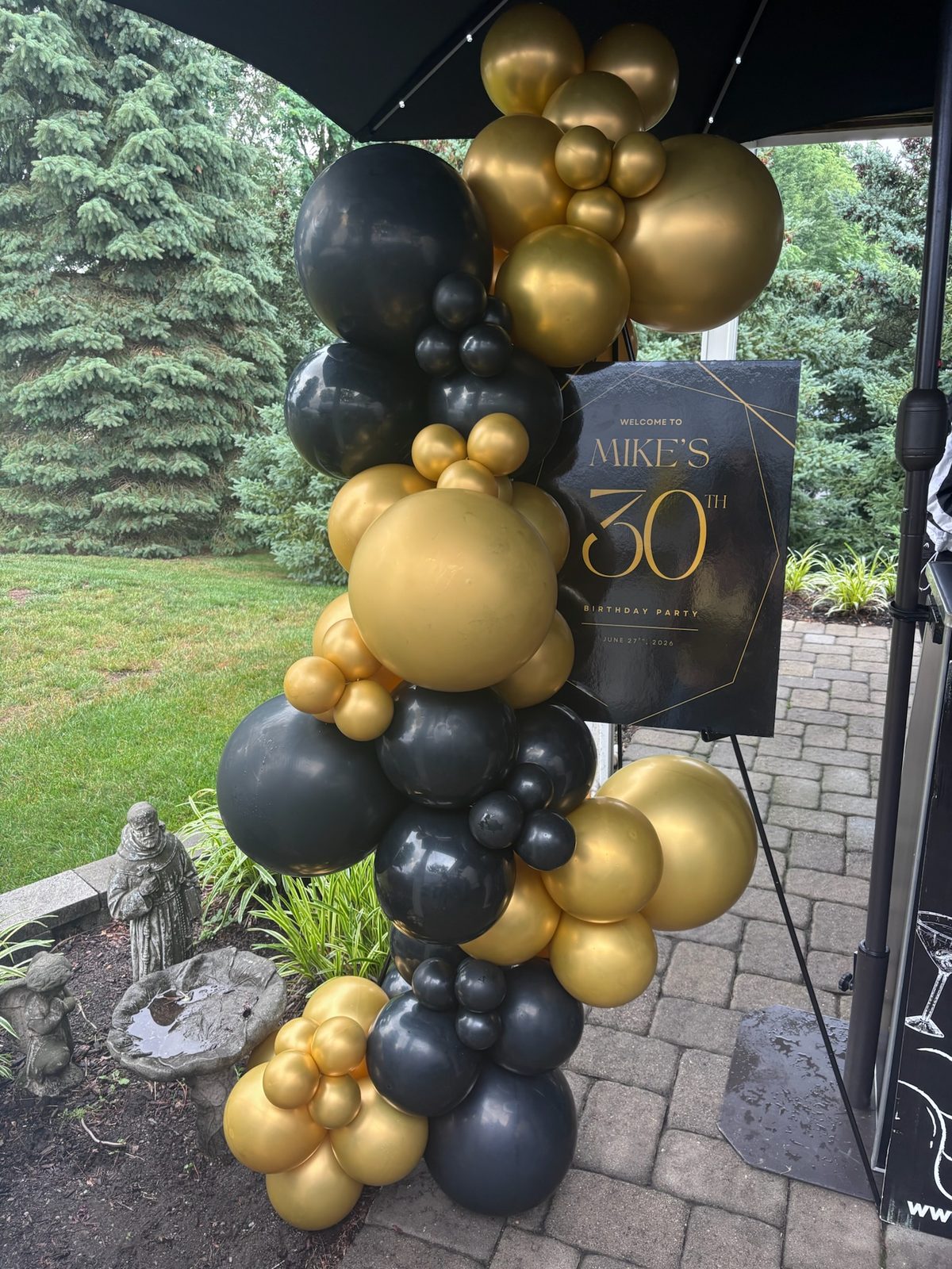 Black and gold luxury birthday balloon column